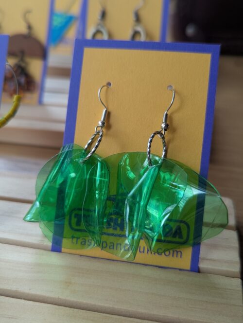 Green upcycled plastic dangly earrings on a jewellery display card
